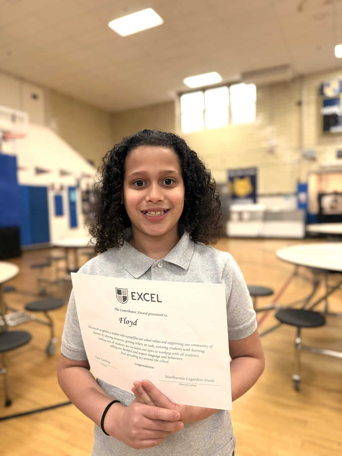 Floyd edited a student holds an award