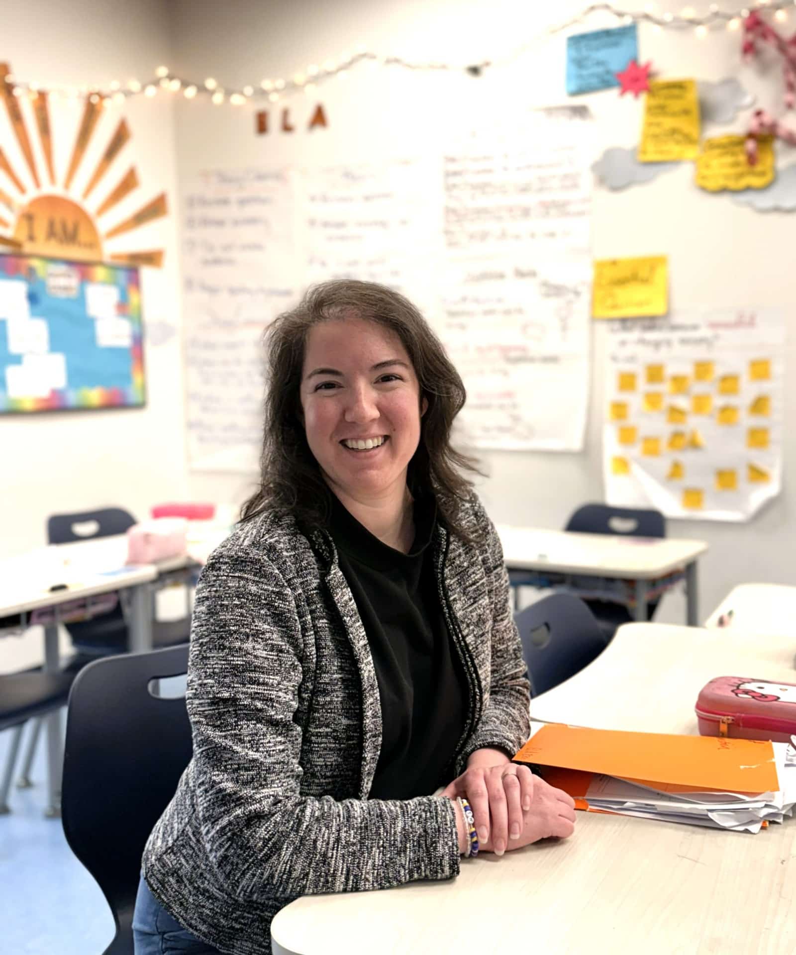 Beth Northup A woman sits at a desk in a classroom